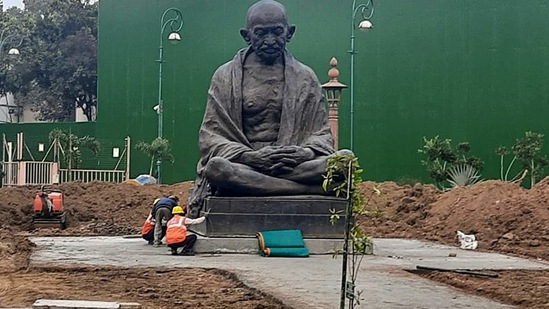 New Delhi: Statue of Mahatma Gandhi relocated in between Gate No 2 and 3 of Parliament House for the ongoing construction of the new Parliament building, in New Delhi, Tuesday, Jan. 19, 2021. (PTI Photo)(PTI01_20_2021_000192A)(PTI)