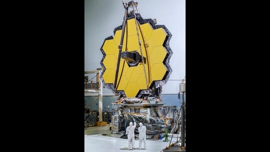 This giant, gold-plated mirror panel is part of the James Webb Space Telescope. Due for deployment later this year, it will be the world’s most powerful space-viewing observatory. (NASA / JWST) This giant, gold-plated mirror panel is part of the James Webb Space Telescope. Due for deployment later this year, it will be the world’s most powerful space-viewing observatory. (NASA / JWST)