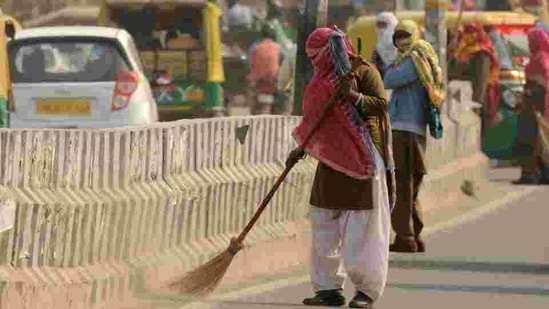 The mayor of the north civic body said that the sanitation employees will return to work from Sunday and clear the streets that are filled with garbage. (HT PHOTO). The mayor of the north civic body said that the sanitation employees will return to work from Sunday and clear the streets that are filled with garbage. (HT PHOTO).