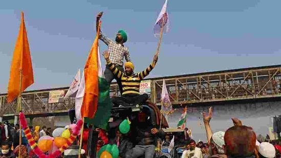 Farmers protest during a tractor rally near the Singhu border crossing in Delhi, on January 26. (Bloomberg)