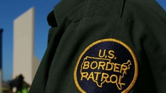 A border patrol officer stands along the US- Mexico border (Reuters File Photo) A border patrol officer stands along the US- Mexico border (Reuters File Photo)