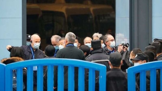 Members of the World Health Organization (WHO) team tasked with investigating the origins of the coronavirus disease (COVID-19) visit Huanan seafood market in Wuhan, Hubei province, China January 31, 2021. REUTERS/Thomas Peter (REUTERS)