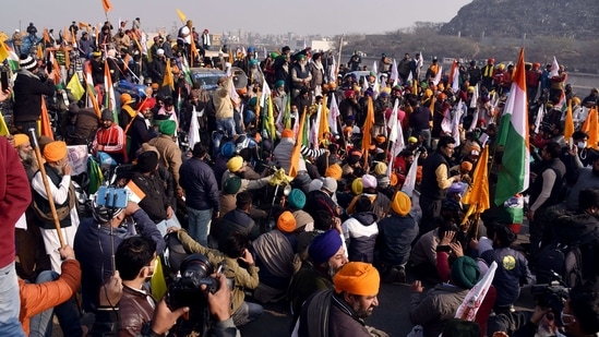 Farmers protest against farm laws during tractor rally on 72nd Republic Day at Singhu Border in New Delhi on Tuesday. (ANI Photo) Farmers protest against farm laws during tractor rally on 72nd Republic Day at Singhu Border in New Delhi on Tuesday. (ANI Photo)