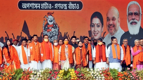 Union minister Smriti Irani (C) and other BJP leaders at a rally at Domurjala Stadium in Howrah district on Sunday. (PTI) Union minister Smriti Irani (C) and other BJP leaders at a rally at Domurjala Stadium in Howrah district on Sunday. (PTI)