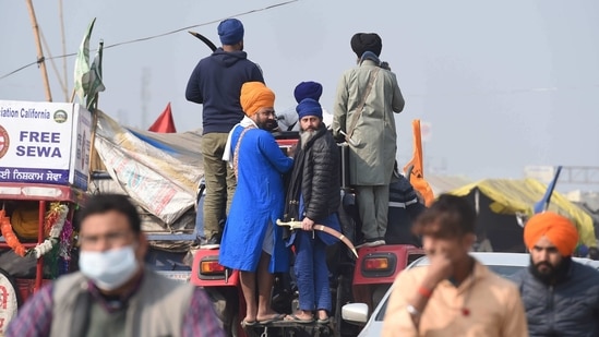 Farmers at Singhu border during their ongoing agitation against Centre's farm reform laws, in New Delhi.(PTI)