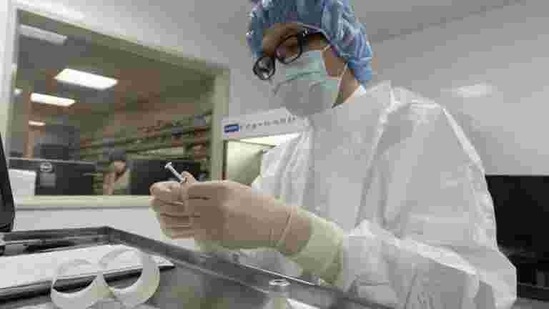 The mission, delayed by China and weighed down by political baggage, has a remit to explore how the virus jumped from animal to human. (AP) The mission, delayed by China and weighed down by political baggage, has a remit to explore how the virus jumped from animal to human. (AP)
