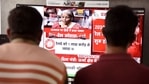 Employees watch Finance Minister Nirmala Sitharaman tabling the Union Budget 2021-22 in the Lok Sabha, at a showroom in Bikaner on Monday. (ANI Photo) Employees watch Finance Minister Nirmala Sitharaman tabling the Union Budget 2021-22 in the Lok Sabha, at a showroom in Bikaner on Monday. (ANI Photo)