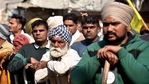 Farmers standing during an ongoing protest against the new farm laws, at the Singhu border in New Delhi on Monday. (ANI Photo) Farmers standing during an ongoing protest against the new farm laws, at the Singhu border in New Delhi on Monday. (ANI Photo)