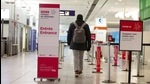 A traveller walks into a Covid-19 testing clinic at Montreal-Pierre Elliott Trudeau International Airport (YUL) in Montreal, Quebec, Canada. (Bloomberg) A traveller walks into a Covid-19 testing clinic at Montreal-Pierre Elliott Trudeau International Airport (YUL) in Montreal, Quebec, Canada. (Bloomberg)