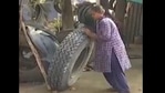 Adilaxmi, works with her husband in their automobile repair shop at Sujatha Nagar, near Kothagudem.(Twitter/@RaoKavitha) Adilaxmi, works with her husband in their automobile repair shop at Sujatha Nagar, near Kothagudem.(Twitter/@RaoKavitha)