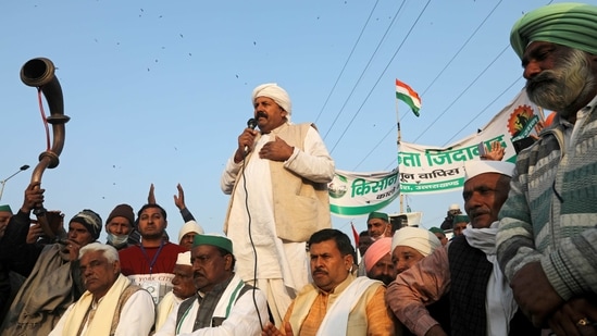 FILE PHOTO: Bharatiya Kisan Union national president, Naresh Tikait, addresses a crowd of farmers taking part in a protest against farm bills passed by India's parliament at Delhi-Uttar Pradesh border on the outskirts of Delhi, India, December 17, 2020. REUTERS/Anushree Fadnavis REFILE - CORRECTING ID/File Photo (REUTERS)