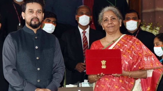 Union Minister for Finance and Corporate Affairs, Nirmala Sitharaman along with the Minister of State for Finance and Corporate Affairs, Anurag Singh Thakur arrives at Parliament House to present the General Budget 2021-22, in New Delhi on Monday. (ANI Photo) Union Minister for Finance and Corporate Affairs, Nirmala Sitharaman along with the Minister of State for Finance and Corporate Affairs, Anurag Singh Thakur arrives at Parliament House to present the General Budget 2021-22, in New Delhi on Monday. (ANI Photo)