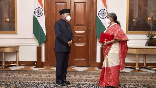President Ram Nath Kovind with Union Finance Minister Nirmala Sitharaman, before the Budget Session, on February 1. Sitharaman said the government is ready to revive growth across all sectors of the economy and the fiscal deficit for FY21 has been pegged at 9.5% of the GDP, and will come down to 6.8% in FY22. (PTI)
