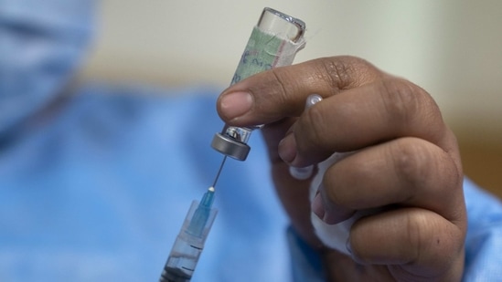 “Two or more vaccines are expected soon, and I allot <span class='webrupee'>₹</span>35,000 crore for Covid-19 vaccines in 2021-22, and [am] committed to providing more funds, if required,” said Nirmala Sitharaman.(Bloomberg)
