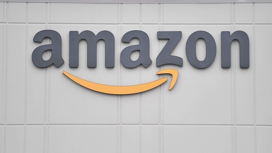 (FILES) In this file photo the logo of US online retail giant Amazon is seen at the distribution center in Staten Island on March 30, 2020 in New York. - Amazon on January 5, 2021 announced it bought jets from a pair of airlines, bolstering its delivery network as online shopping booms and travel withers during the pandemic. The e-commerce colossus launched its air shipping division four years ago, but had previously relied on leased jets. (Photo by Angela Weiss / AFP) (AFP) (FILES) In this file photo the logo of US online retail giant Amazon is seen at the distribution center in Staten Island on March 30, 2020 in New York. - Amazon on January 5, 2021 announced it bought jets from a pair of airlines, bolstering its delivery network as online shopping booms and travel withers during the pandemic. The e-commerce colossus launched its air shipping division four years ago, but had previously relied on leased jets. (Photo by Angela Weiss / AFP) (AFP)