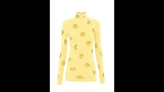 The image shows a yellow coloured openwork viscose turtleneck sweater.(Prada.com)