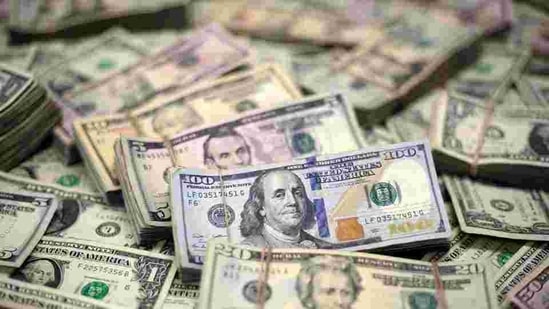 US Dollar banknotes are seen in this photo illustration. (Representative Image) (REUTERS Photo) US Dollar banknotes are seen in this photo illustration. (Representative Image) (REUTERS Photo)