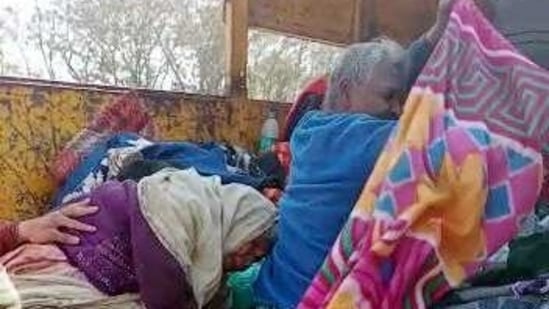Elderly homeless people were dropped off by the side of a highway on the city's outskirts by Indore municipal workers, in Indore on Saturday. (ANI) Elderly homeless people were dropped off by the side of a highway on the city's outskirts by Indore municipal workers, in Indore on Saturday. (ANI)