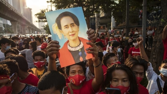 A demonstrator holds up an image of Aung San Suu Kyi during a protest outside the Embassy of Myanmar in Bangkok, Thailand. (Bloomberg) A demonstrator holds up an image of Aung San Suu Kyi during a protest outside the Embassy of Myanmar in Bangkok, Thailand. (Bloomberg)