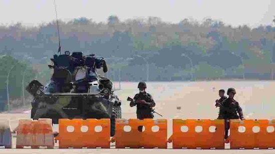 Myanmar's military checkpoint is seen on the way to the congress compound in Naypyitaw, Myanmar, on February 1. (Reuters) Myanmar's military checkpoint is seen on the way to the congress compound in Naypyitaw, Myanmar, on February 1. (Reuters)