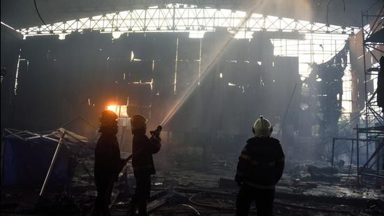 A level two fire was reported in a film set behind Inorbit Mall in Bangur Nagar area of Goregaon. (Satish Bate/HT Photo) A level two fire was reported in a film set behind Inorbit Mall in Bangur Nagar area of Goregaon. (Satish Bate/HT Photo)