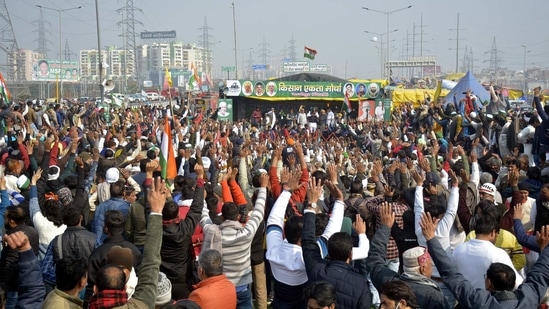 Farmers raise slogans during the protest at Ghazipur near New Delhi on January 29. After Tikait’s video in tears went viral, a large number of farmers started moving towards Ghazipur. For the first time since the protests began in November, attention, restricted largely to the two larger protests sites, Singhu and Tikri had moved to Ghazipur.(Sakib ALi / HT Photo)