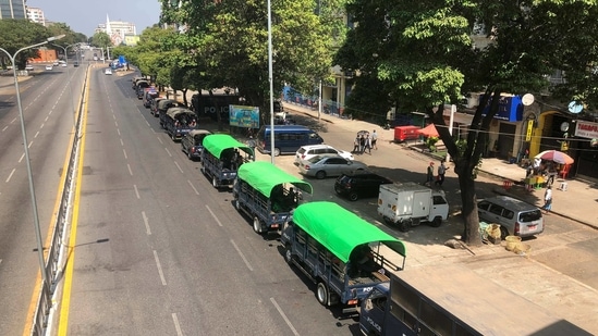 Police trucks are parked at Kyauktada police station in Yangon. (AP) Police trucks are parked at Kyauktada police station in Yangon. (AP)