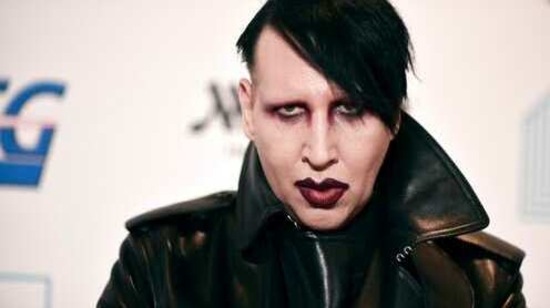 FILE - Marilyn Manson attends the 9th annual "Home for the Holidays" benefit concert on Dec. 10, 2019, in Los Angeles. Manson was dropped by his record label Monday after his ex-fiancé, the actor Evan Rachel Wood, accused him of sexual and other physical abuse. (Photo by Richard Shotwell/Invision/AP, File) (Richard Shotwell/Invision/AP) FILE - Marilyn Manson attends the 9th annual "Home for the Holidays" benefit concert on Dec. 10, 2019, in Los Angeles. Manson was dropped by his record label Monday after his ex-fiancé, the actor Evan Rachel Wood, accused him of sexual and other physical abuse. (Photo by Richard Shotwell/Invision/AP, File) (Richard Shotwell/Invision/AP)