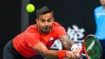 India's Sumit Nagal makes a backhand return to Lithuania's Ricardas Berankis during a tuneup tournament ahead of the Australian Open tennis championships in Melbourne, Australia, Monday, Feb. 1, 2021. (AP) India's Sumit Nagal makes a backhand return to Lithuania's Ricardas Berankis during a tuneup tournament ahead of the Australian Open tennis championships in Melbourne, Australia, Monday, Feb. 1, 2021. (AP)