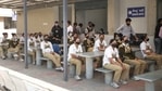 Women police personnel wait for their turn to get registered for the first dose of Covid-19 vaccine at a vaccination centre at Civil Hospital, in Ahmedabad.(PTI) Women police personnel wait for their turn to get registered for the first dose of Covid-19 vaccine at a vaccination centre at Civil Hospital, in Ahmedabad.(PTI)
