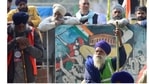 Farmers at Singhu border during their ongoing protest against the new farm laws, in New Delhi.(PTI) Farmers at Singhu border during their ongoing protest against the new farm laws, in New Delhi.(PTI)