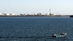 A speed boat passes by oil docks at the port of Kalantari in the city of Chabahar, east of the Strait of Hormuz. (Reuters File) A speed boat passes by oil docks at the port of Kalantari in the city of Chabahar, east of the Strait of Hormuz. (Reuters File)