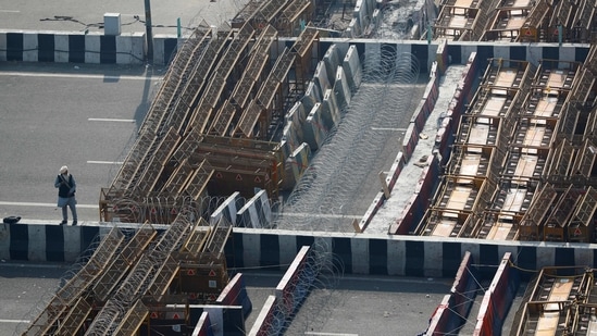 The police have created multiple layers of barriers near the three protest sites at Ghazipur, Tikri and Singhu to contain the protesters there and to prevent them from entering Delhi.(Reuters)