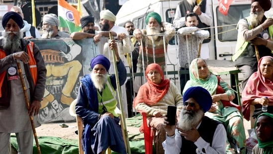 Farmers at the site during their ongoing protest against farm laws at Singhu border, in Delhi on Tuesday. (ANI Photo )