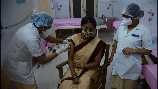 In the second phase, Asha workers were vaccinated at Thane Civil Hospital on Wednesday, January 27, 2021. (Praful Gangurde/HT Photo) In the second phase, Asha workers were vaccinated at Thane Civil Hospital on Wednesday, January 27, 2021. (Praful Gangurde/HT Photo)