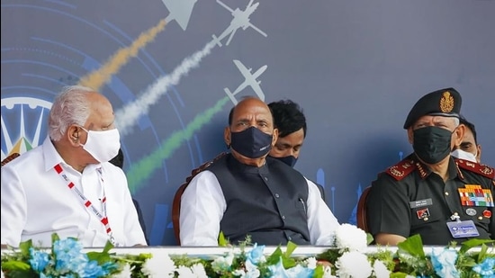 Defence minister Rajnath Singh , Karnataka chief minister BS Yediyurappa and CODS Gen Bipin Rawat during the inaugural ceremony of Aero India 2021 show, in Bengaluru. (PTI) Defence minister Rajnath Singh , Karnataka chief minister BS Yediyurappa and CODS Gen Bipin Rawat during the inaugural ceremony of Aero India 2021 show, in Bengaluru. (PTI)