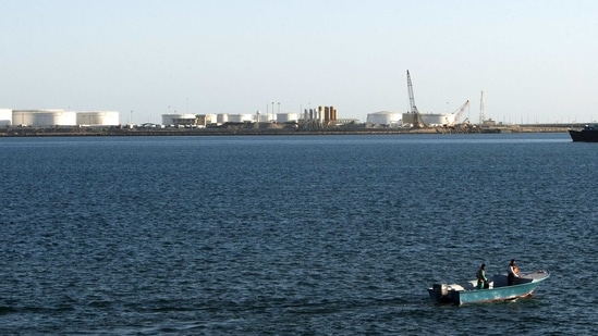 A speed boat passes by oil docks at the port of Kalantari in the city of Chabahar, east of the Strait of Hormuz. (Reuters File) A speed boat passes by oil docks at the port of Kalantari in the city of Chabahar, east of the Strait of Hormuz. (Reuters File)
