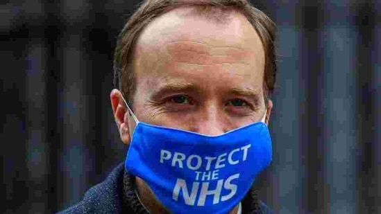 Britain's Health Secretary Matt Hancock wearing a face mask leaves Downing Street in London, Britain.(Reuters)