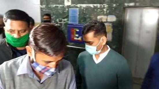 IPS officer Manish Agarwal (right) been presented in the ACB court in Jaipur on Wednesday. (HT PHOTO) IPS officer Manish Agarwal (right) been presented in the ACB court in Jaipur on Wednesday. (HT PHOTO)