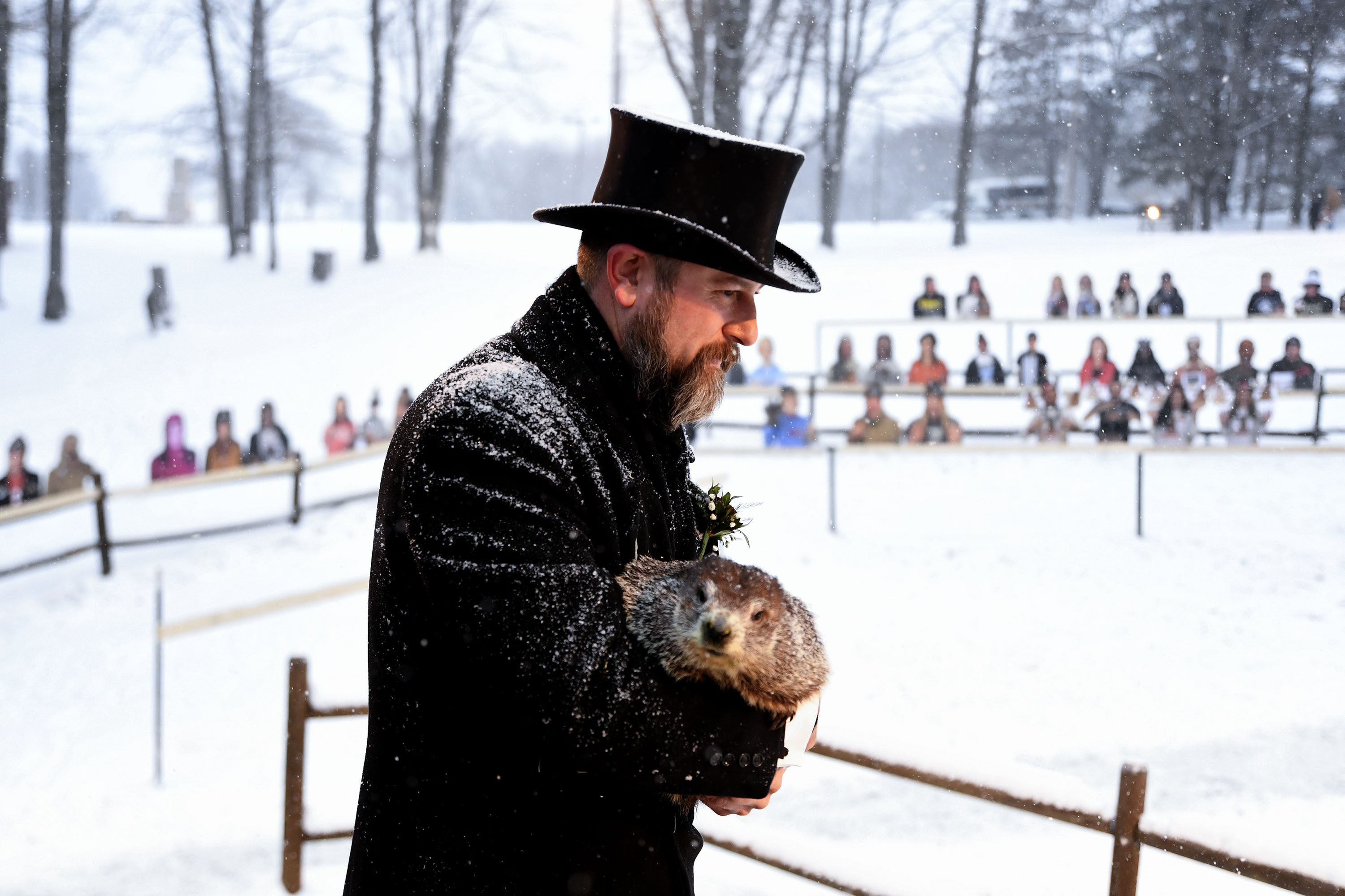 Groundhog Club handler A.J. Dereume holds Punxsutawney Phil, the weather prognosticating groundhog. (AP) Groundhog Club handler A.J. Dereume holds Punxsutawney Phil, the weather prognosticating groundhog. (AP)