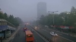 Vehicles move amid the dense fog with low visibility as the air quality decreases, in New Delhi on Sunday. (ANI Photo) Vehicles move amid the dense fog with low visibility as the air quality decreases, in New Delhi on Sunday. (ANI Photo)