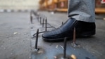 A farmer inspects metal spikes at a barricade erected by the police that blocks a highway in Ghazipur on the outskirts of New Delhi, India, on Wednesday, Feb. 3, 2021. (Bloomberg) A farmer inspects metal spikes at a barricade erected by the police that blocks a highway in Ghazipur on the outskirts of New Delhi, India, on Wednesday, Feb. 3, 2021. (Bloomberg)