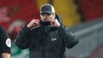 Liverpool's manager Jurgen Klopp fixes his protective mask during the English Premier League soccer match between Liverpool and Brighton at Anfield stadium, in Liverpool, England, Wednesday, Feb. 3, 2021.(AP) Liverpool's manager Jurgen Klopp fixes his protective mask during the English Premier League soccer match between Liverpool and Brighton at Anfield stadium, in Liverpool, England, Wednesday, Feb. 3, 2021.(AP)