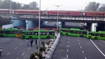 DTC buses blocking the road after being used as barricades during the farmers' rally on Republic Day, at ITO in New Delhi(Arvind Yadav/HT Photo) DTC buses blocking the road after being used as barricades during the farmers' rally on Republic Day, at ITO in New Delhi(Arvind Yadav/HT Photo)