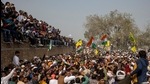 People attend a Maha Panchayat or grand village council meeting as part of a farmers' protest at Kandela village in Jind district of Haryana on Wednesday. (Reuters) People attend a Maha Panchayat or grand village council meeting as part of a farmers' protest at Kandela village in Jind district of Haryana on Wednesday. (Reuters)