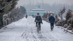 A cyclists rides on a slippery snow covered road after a brief snowfall in Srinagar,(AP) A cyclists rides on a slippery snow covered road after a brief snowfall in Srinagar,(AP)