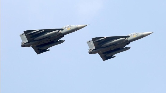 IAF Tejas fly past during the inauguration of the 13th edition of Aero India, at Yelahanka air base in Bengaluru on Wednesday. (ANI) IAF Tejas fly past during the inauguration of the 13th edition of Aero India, at Yelahanka air base in Bengaluru on Wednesday. (ANI)