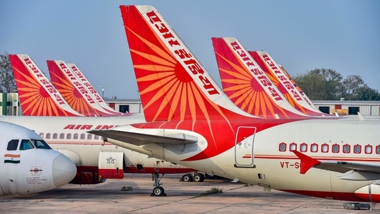  **EDS: FILE PHOTO** New Delhi: In this file photo dated Monday, March 2, 2020, Air India planes are parked at the IGI Airport in New Delhi. Tata Group is seeking to board Air India again after nearly seven decades, with the salt-to-software conglomerate set to participate in the bidding process for the national carrier. (PTI Photo/Ravi Choudhary)(PTI16-12-2020_000272B)(PTI)
