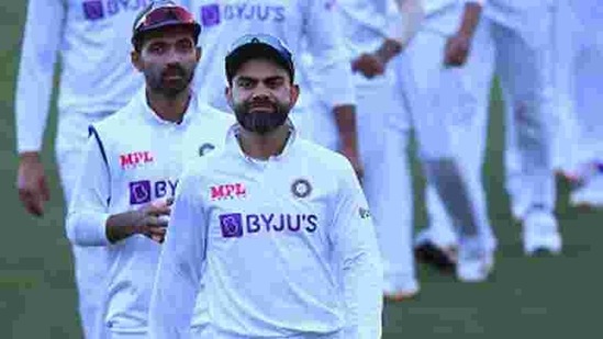 Virat Kohli leads India off the field.(Getty Images)