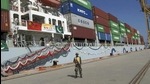 A file photo showing a Pakistan Navy soldier standing guard while a loaded Chinese ship prepares to depart from Gwadar port that links to China's far western region. (AP file) A file photo showing a Pakistan Navy soldier standing guard while a loaded Chinese ship prepares to depart from Gwadar port that links to China's far western region. (AP file)